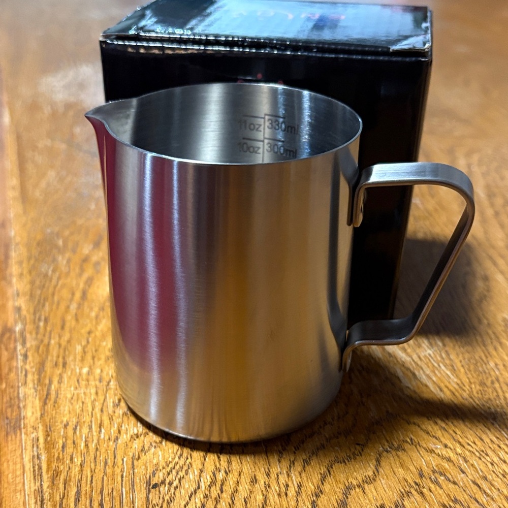 Milk frothing pitcher